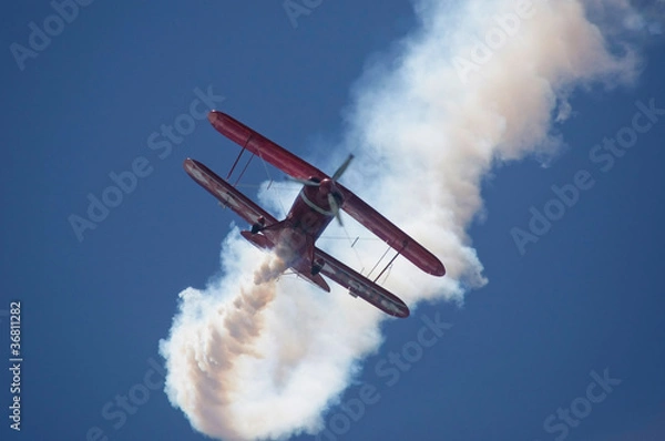 Fototapeta airplane performig in airshow