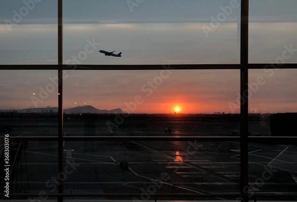 Obraz sunset in the airplane