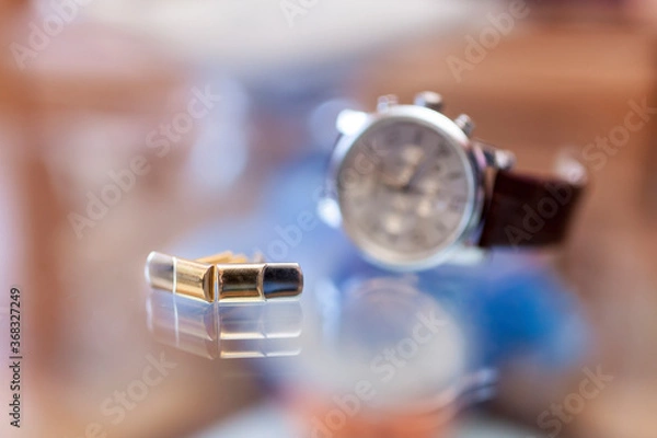 Obraz Cufflinks and wristwatch
