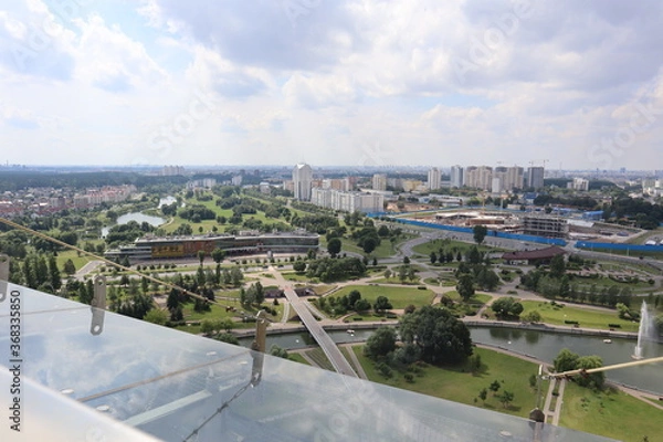 Fototapeta Panorama of a large modern city on a warm summer day. Modern architecture. Urban life concept.