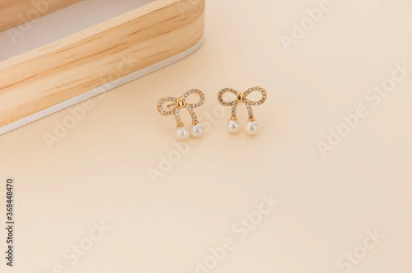 Obraz Close up of diamond earrings. space for your text.