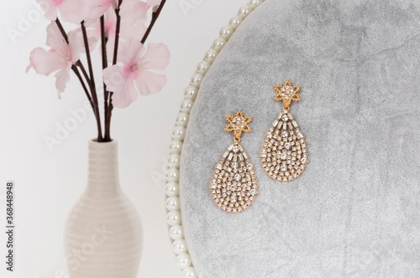 Obraz Close up of diamond earrings. space for your text.
