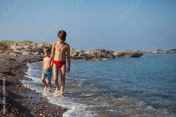 Obraz Brothers rest by the sea