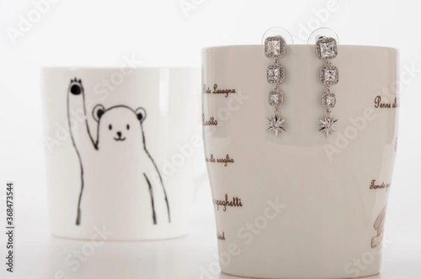 Obraz Close up of diamond earrings. space for your text.