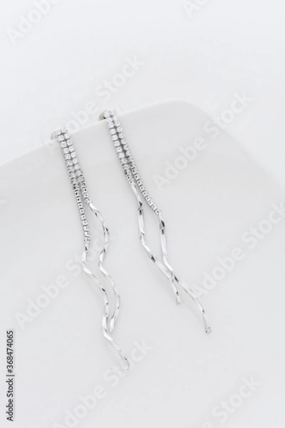 Obraz Close up of diamond earrings. space for your text.