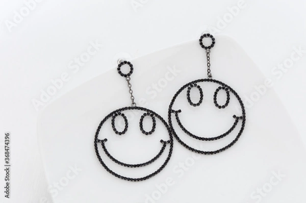Obraz Close up of diamond earrings. space for your text.