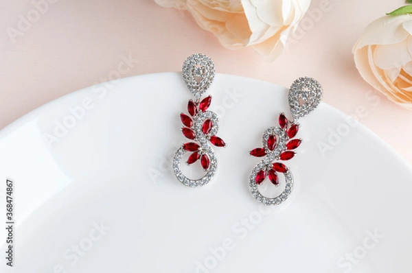 Obraz Close up of diamond earrings. space for your text.