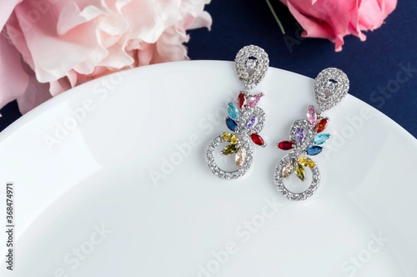 Obraz Close up of diamond earrings. space for your text.