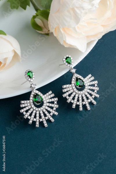 Obraz Close up of diamond earrings. space for your text.