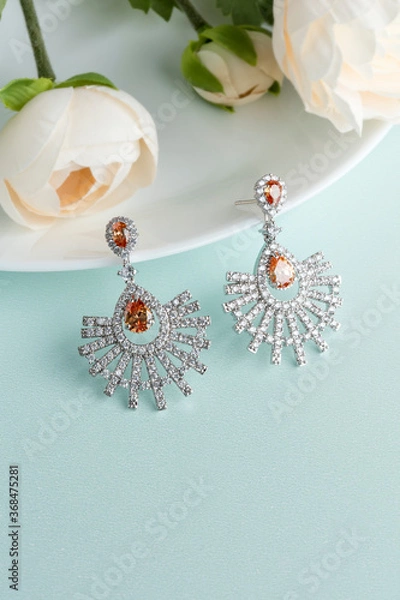 Obraz Close up of diamond earrings. space for your text.