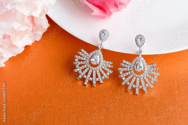 Obraz Close up of diamond earrings. space for your text.