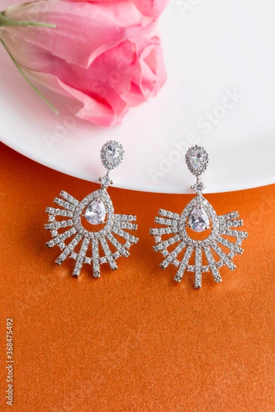 Obraz Close up of diamond earrings. space for your text.
