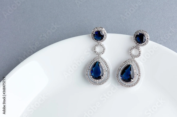 Obraz Close up of diamond earrings. space for your text.