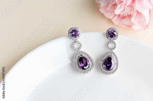 Obraz Close up of diamond earrings. space for your text.