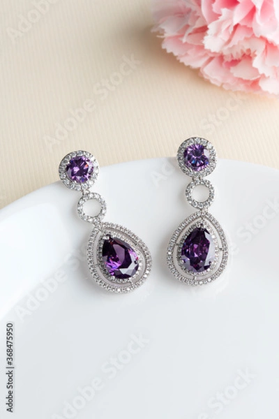 Obraz Close up of diamond earrings. space for your text.