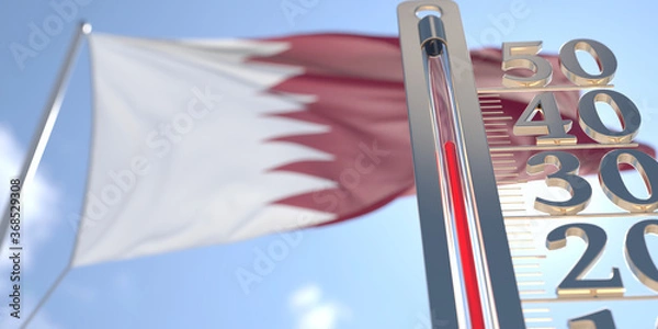 Obraz Thermometer shows high air temperature against blurred flag of Qatar. Hot weather forecast related 3D rendering