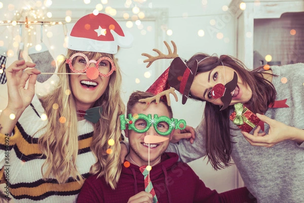 Obraz group of people celebrating christmas