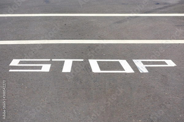 Obraz Temporarily STOP warning traffic sign painted on street surface