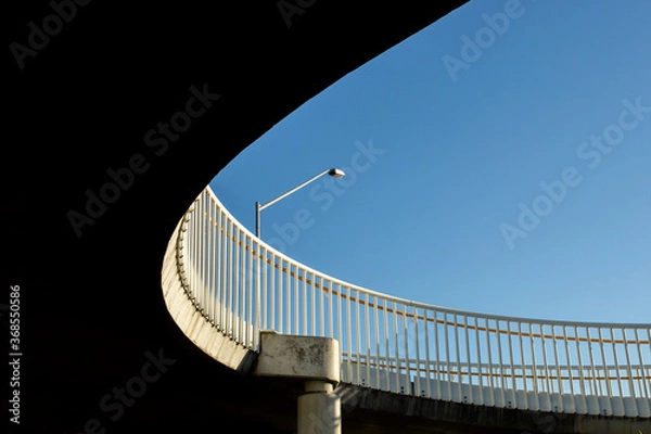 Obraz looking up at the curve of a bridge