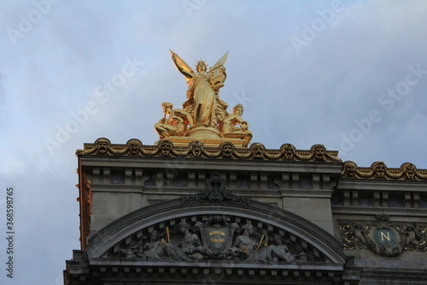 Obraz 建物の上にある天使の像