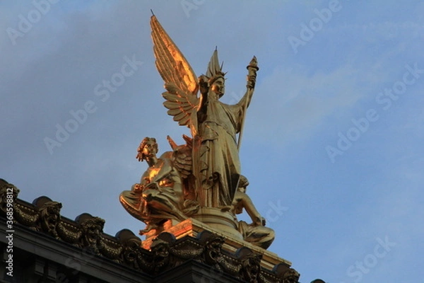 Obraz 夕日を浴びる天使の像