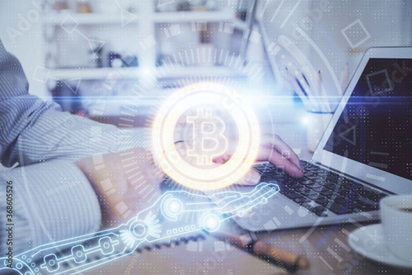 Obraz Blockchain theme hud with man working on computer on background. Concept of crypto chain. Double exposure.