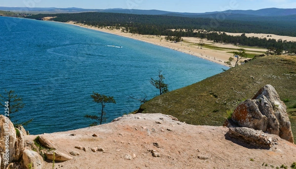 Fototapeta View of the coast of Lake Baikal, Olkhon Island in summer in sunny weather from a cliff