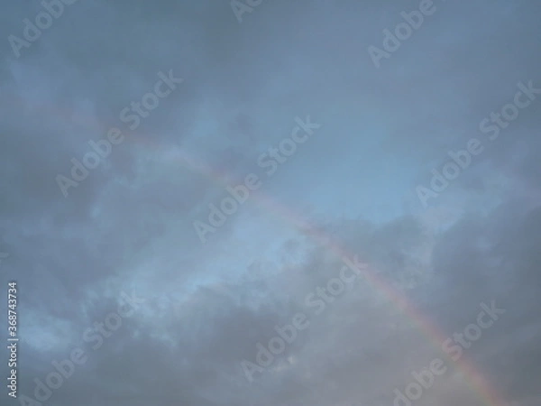 Fototapeta rainbow and clouds