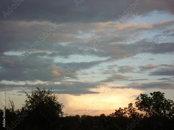 Fototapeta sunset in the clouds