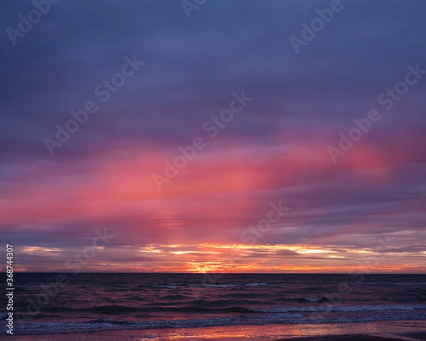 Fototapeta colorful sunset on beach of normandy in france