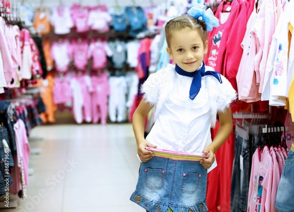 Fototapeta Young woman doing shopping