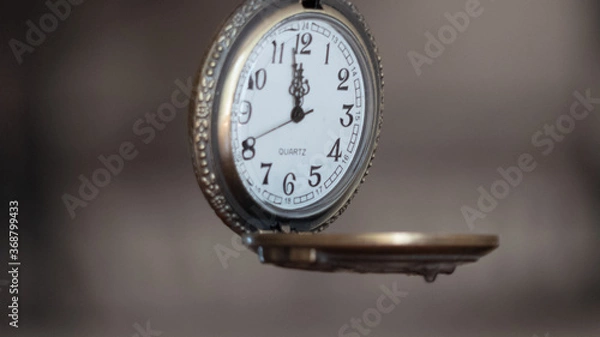 Obraz fob watch suspended at 12pm