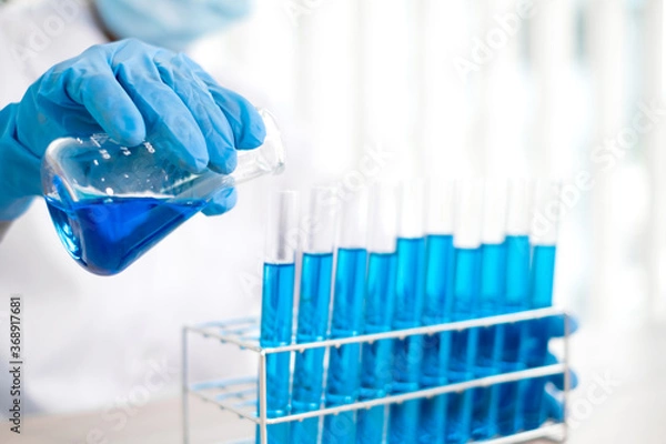 Fototapeta Medical scientists have experimented with liquid chemicals in vitro to analyze viral data in chemical laboratories. Scientific research concepts