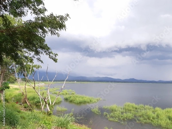 Obraz storm clouds over the estuary
