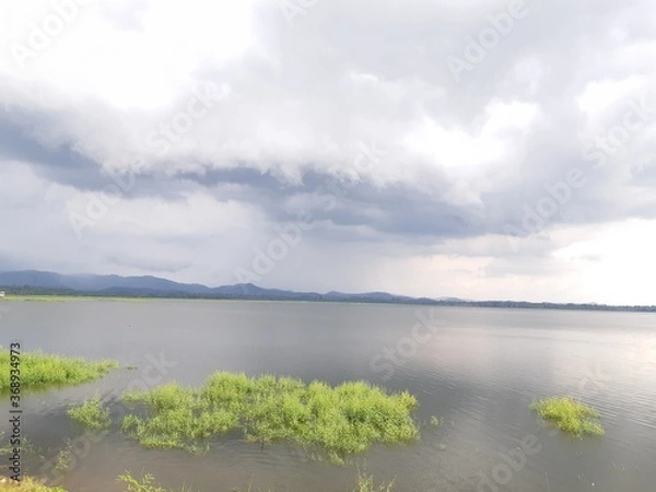 Obraz storm clouds over the estuary