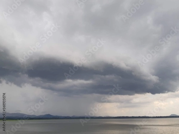 Obraz storm clouds over the estuary