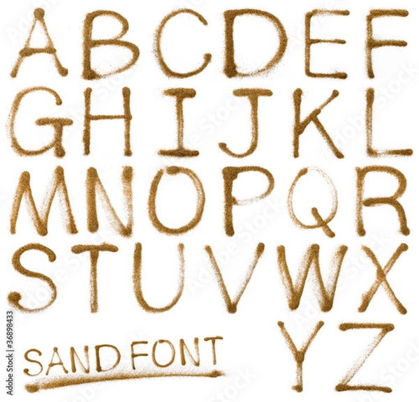 Obraz Sand ABC containing letters,isolated on white background