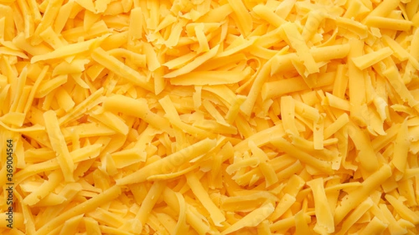 Obraz grated cheddar cheese top view