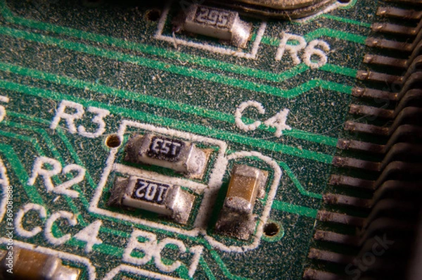 Fototapeta dusty printed circuit Board with components . macro