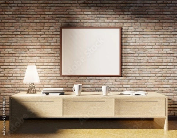 Fototapeta An empty frame on the brick wall above the table. Template of the poster for photos and lettering. 3D rendering.