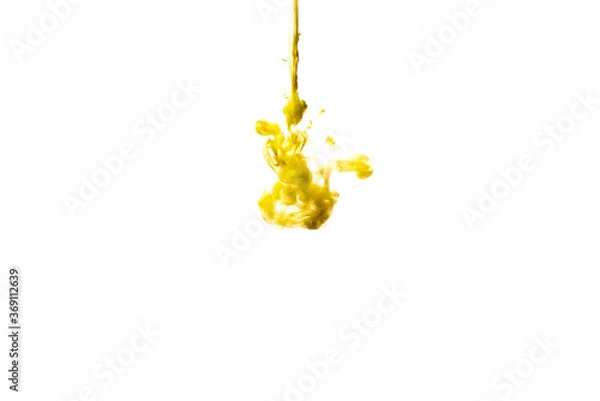 Fototapeta A cloud of yellow paint released into clear water. Isolate on a white background.