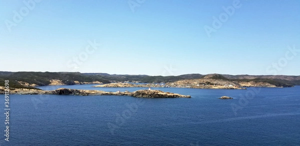 Fototapeta spring landscape with ocean and mountains