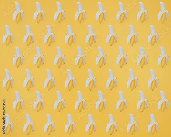 Fototapeta Bananas texture on yellow background