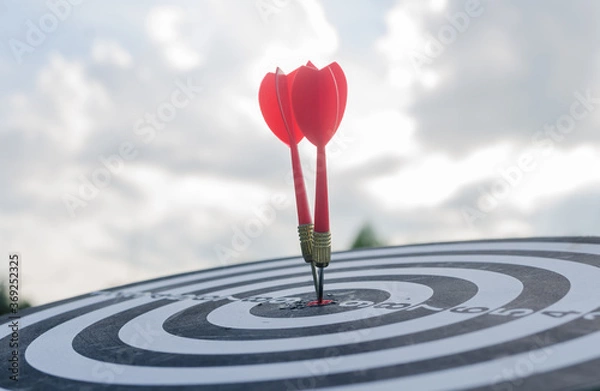 Fototapeta Bullseye is a target of business concept. business marketing as concept. Dartboard is the target and goal concept.