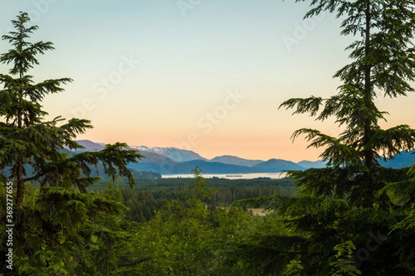 Fototapeta A view of the Douglas Channel at Kitimat from Coghlin Park at sunset