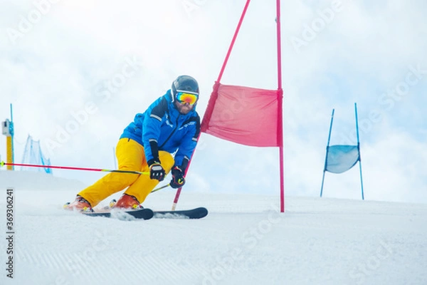 Fototapeta Skier attacks a gate
