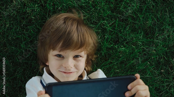 Fototapeta boy with tablet