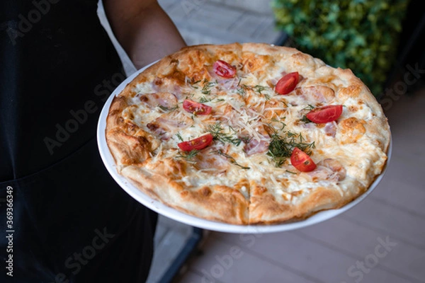 Fototapeta pizza in the oven