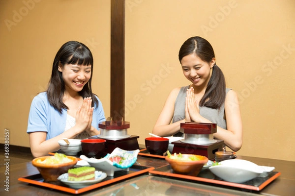 Fototapeta 食事をする女性