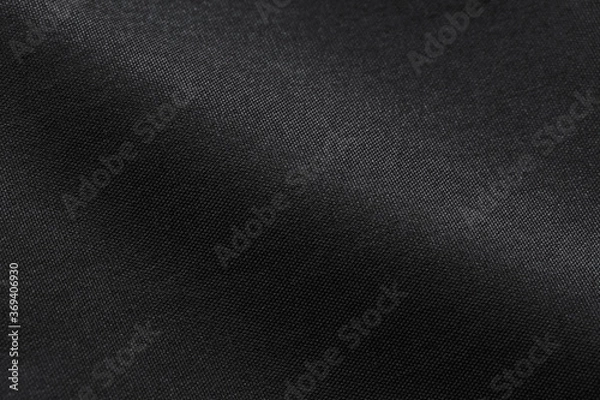 Fototapeta Canvas Polyester texture synthetical for background. Black polyester fabric textile backdrop for interior art design or add text message.